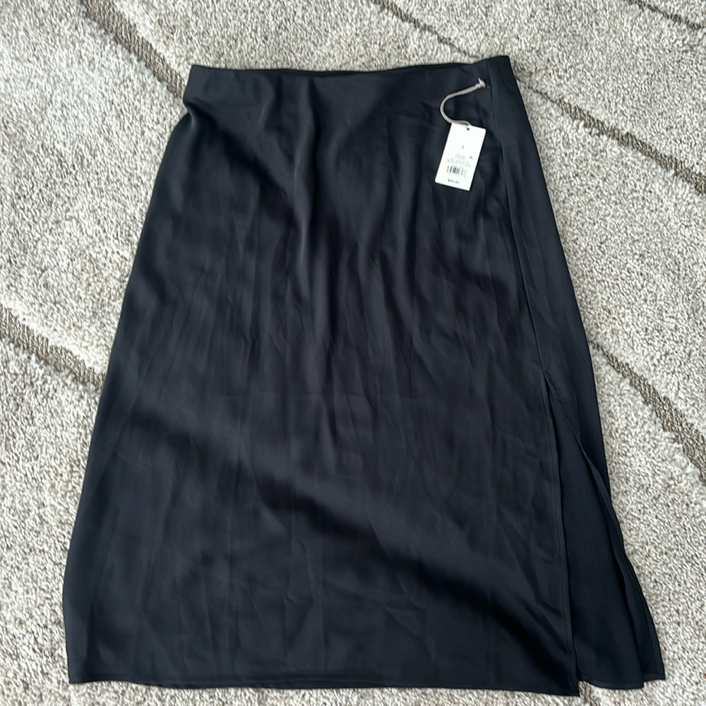 Black Satin Skirt. Mid Length. New and never worn ✨